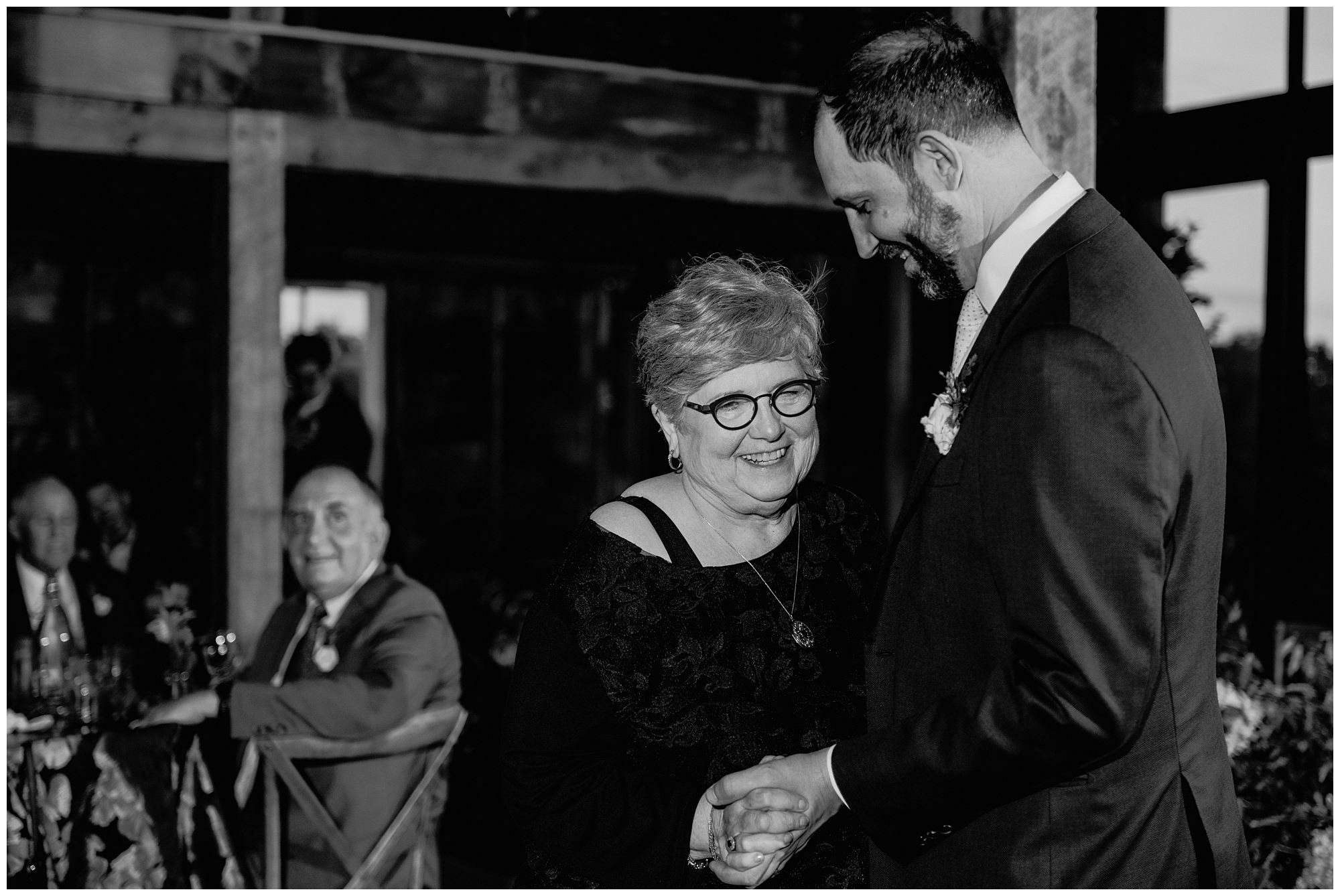 Wedding reception in rustic barn at Scotland fields by York Maine wedding photographer