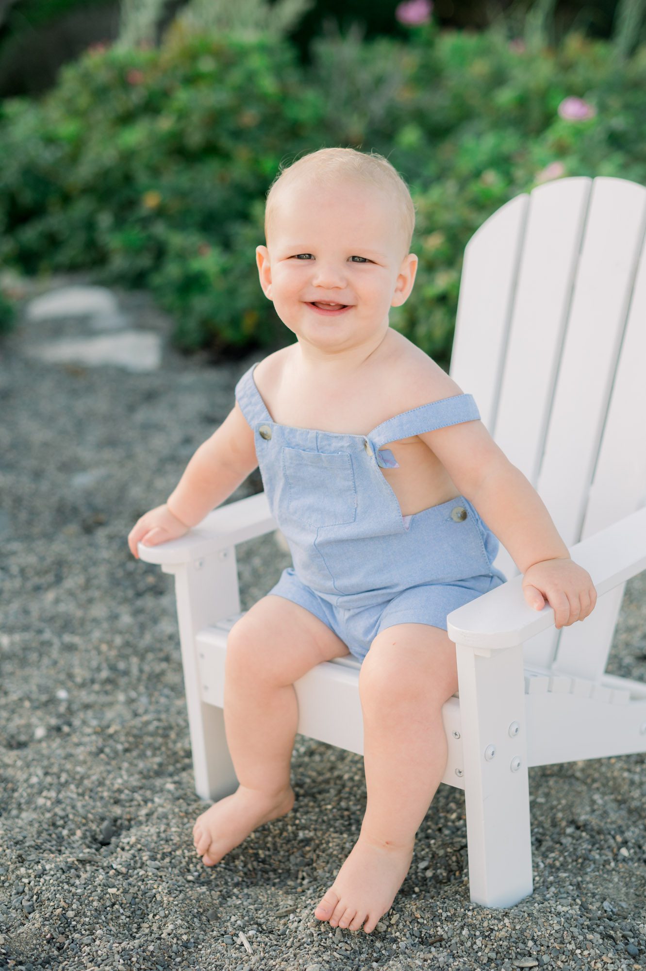 Baby boy on beach chair at the beach in seacoast NH
