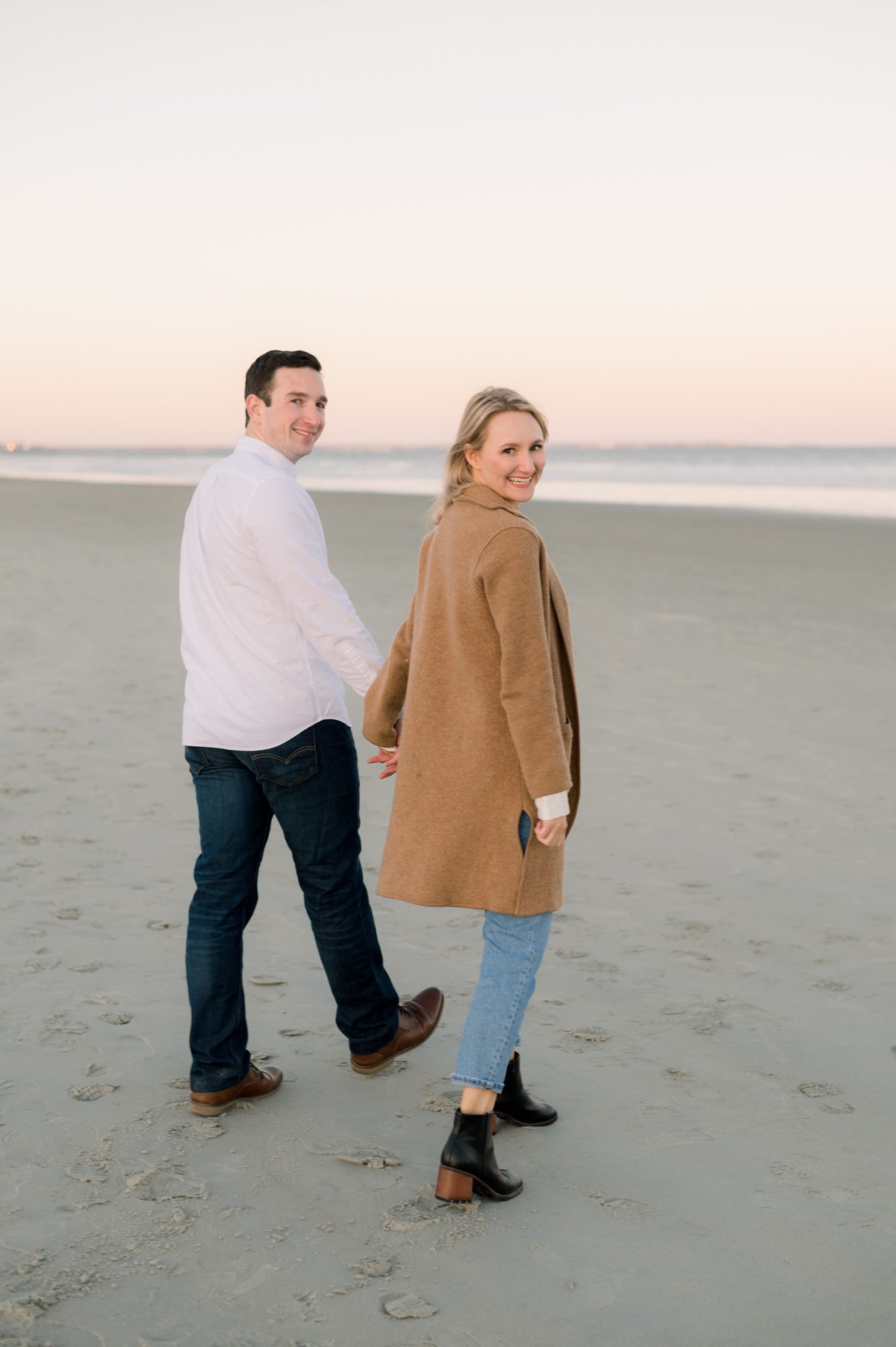 Sunset engagement photo at the beach in Southern Maine
