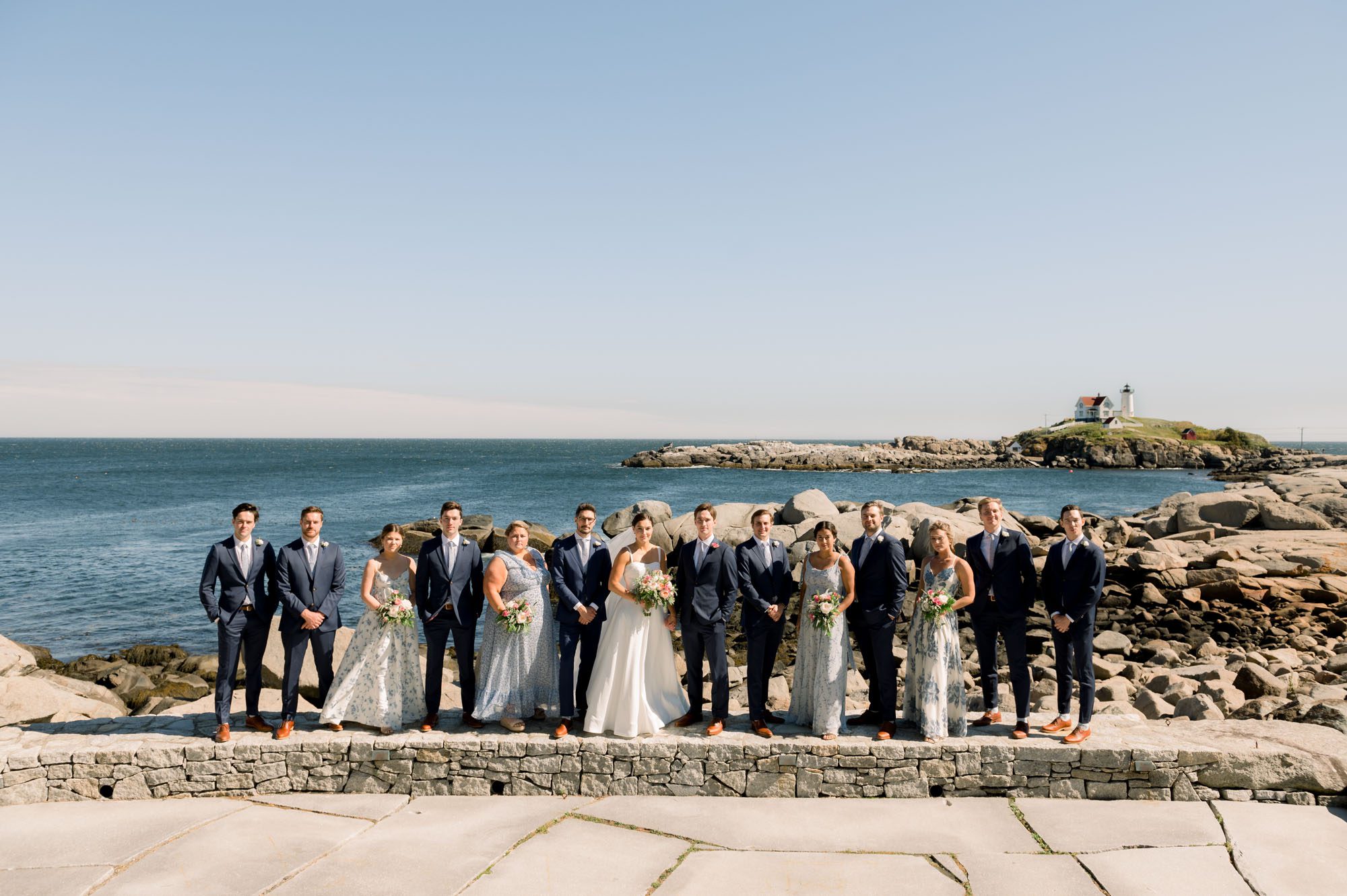 Wedding party at Viewpoint Hotel with Nubble Light House in the distance