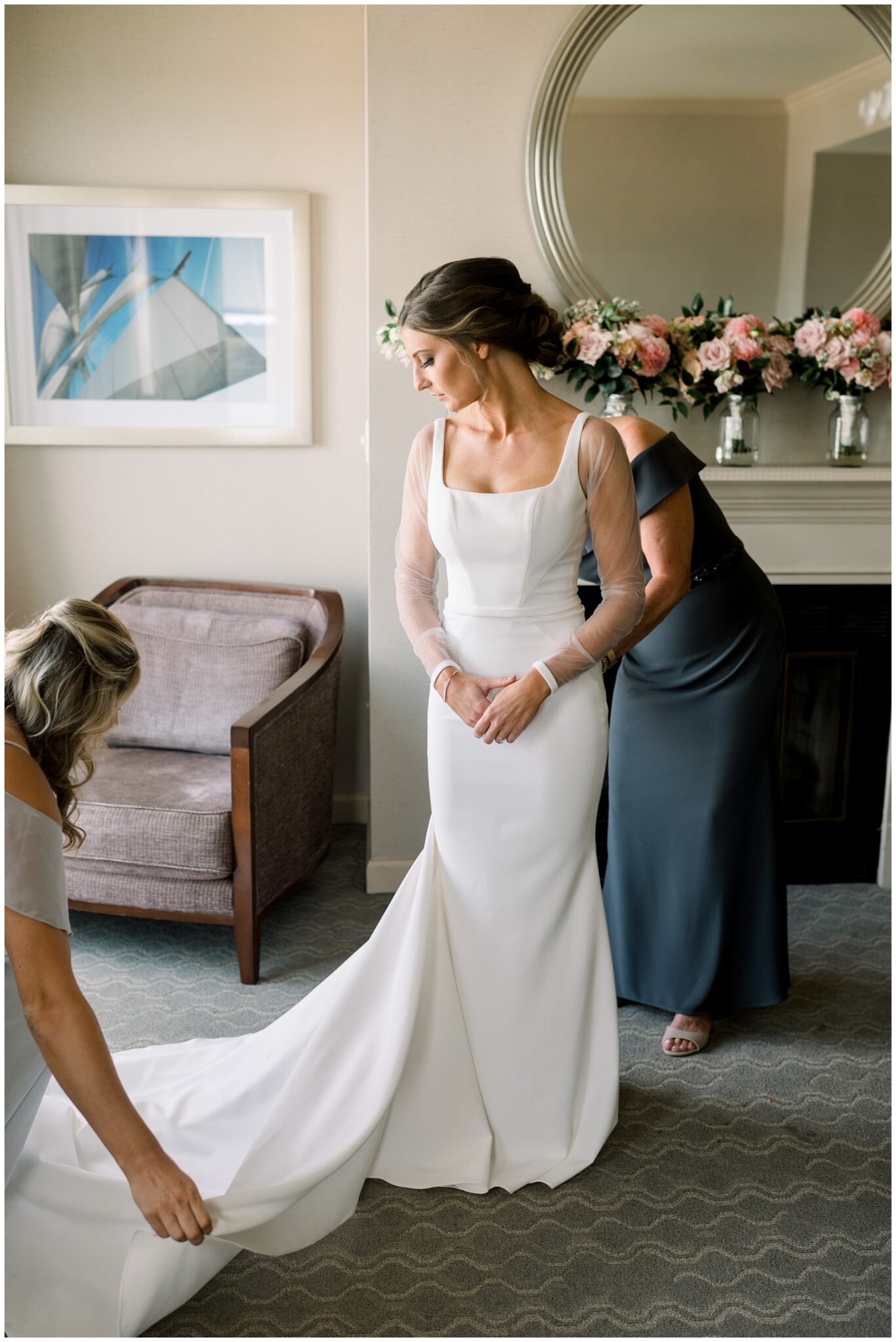 Seacoast NH Wedding Photographer Casey Durgin photographs Bride getting into wedding gown.