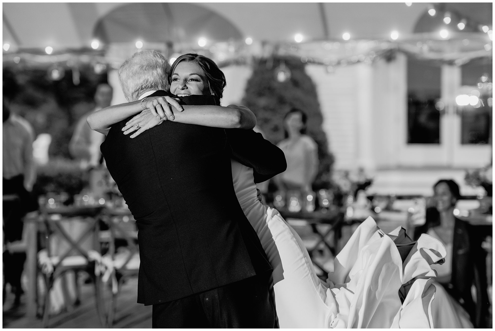 Michelle hugs her father during father daughter dance at Wentworth By The Sea Country Club Wedding.