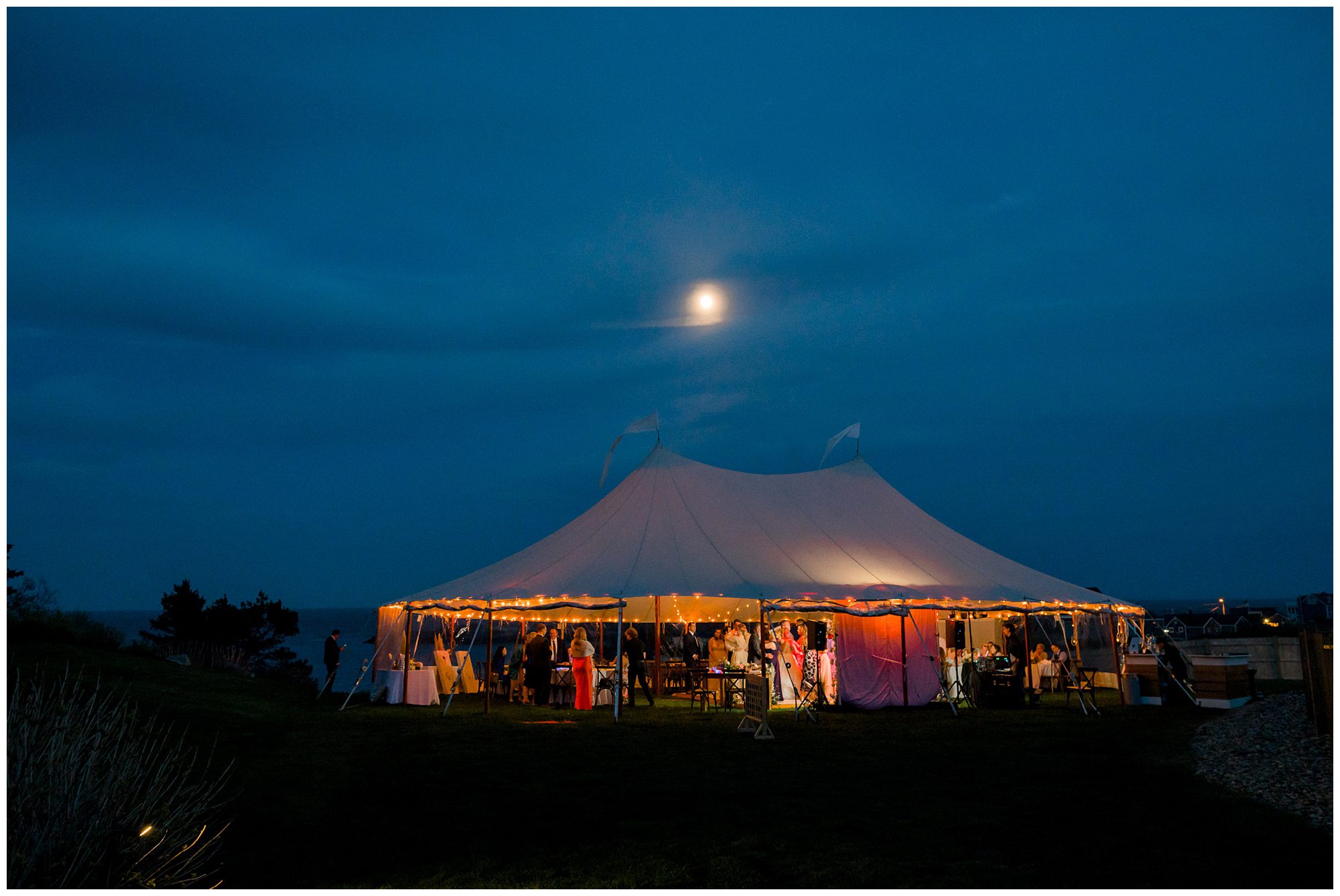 Evening wedding reception photos of tent at Viewpoint Hotel in York Maine