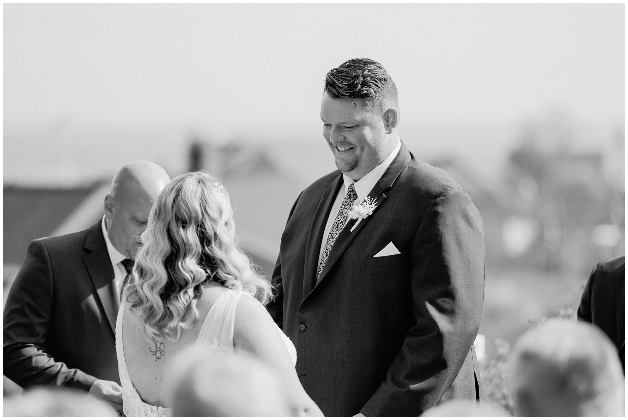 Black & White photo of groom at Viewpoint Hotel wedding ceremony