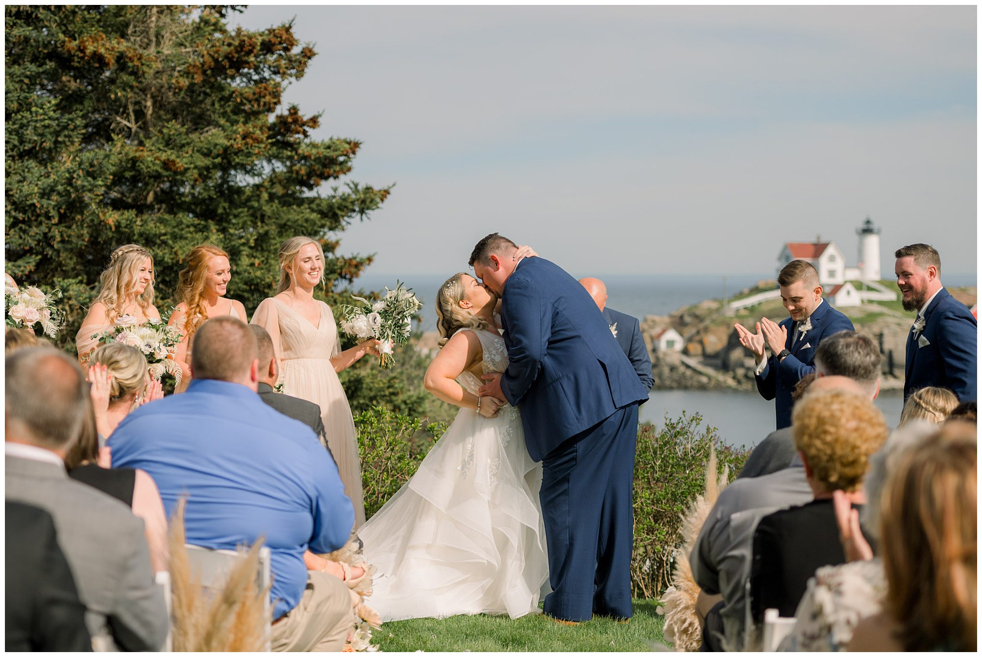 Groom kisses bride to celebrate their marriage at Viewpoint Hotel York Maine