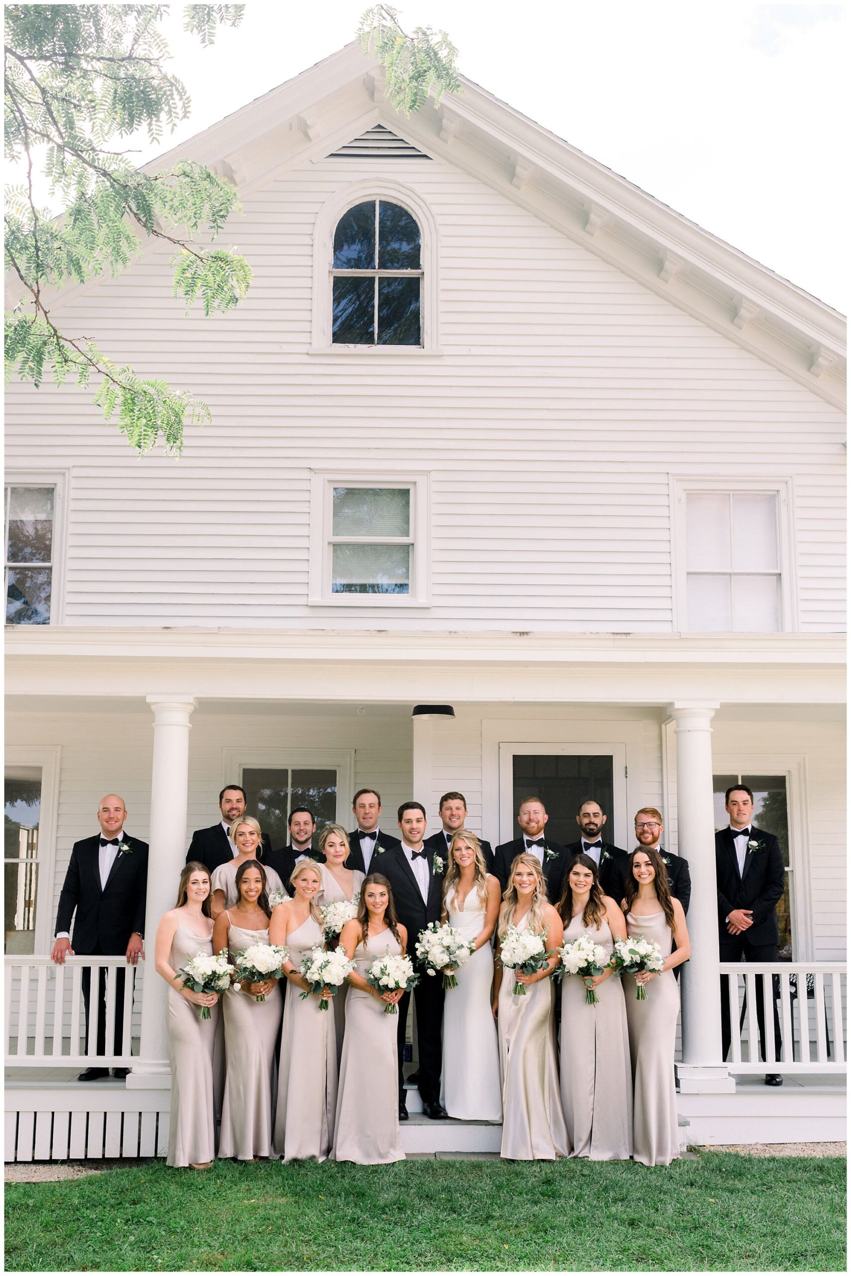 Bridal party of front steps of Scotland fields farmhouse