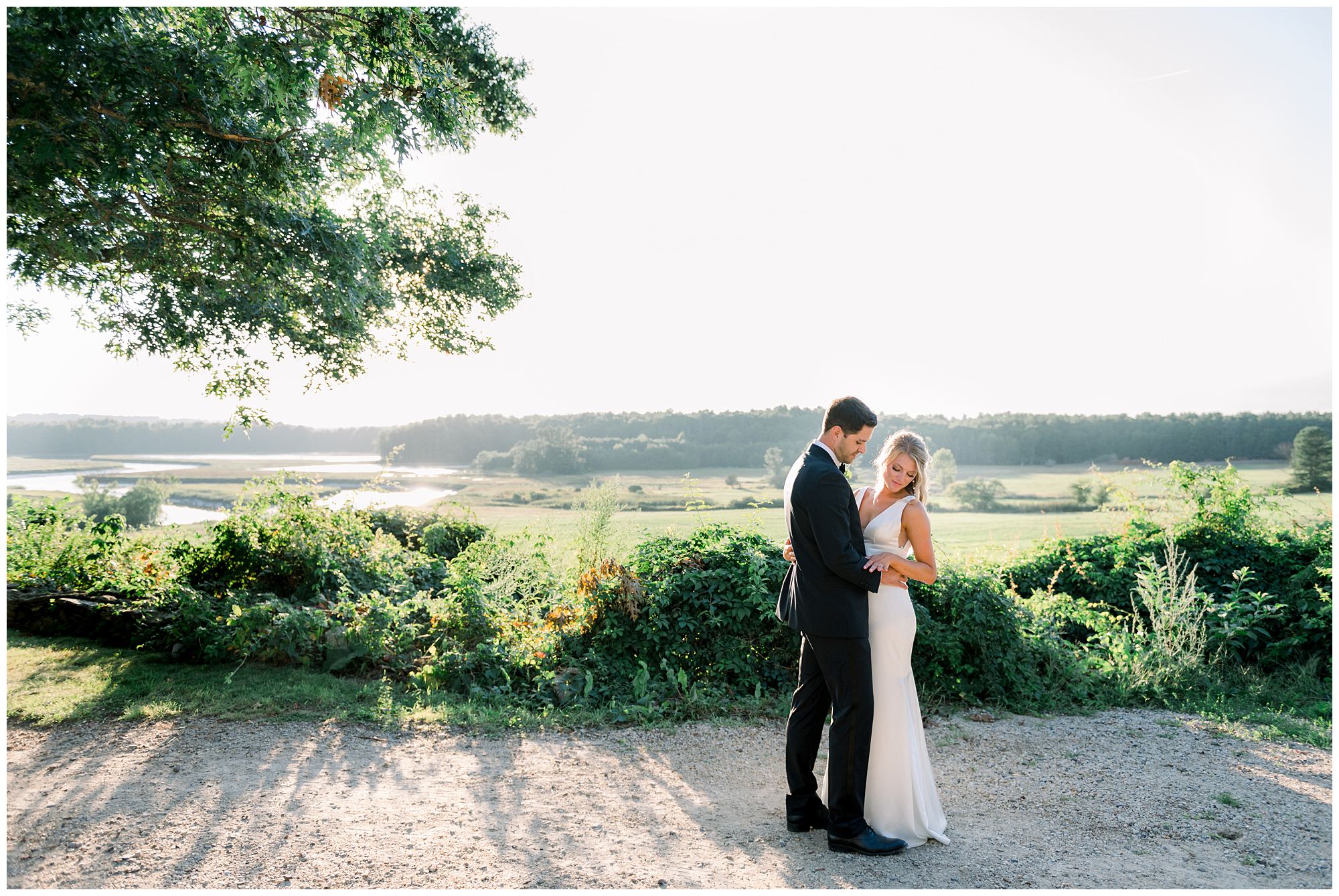Portraits of bride & groom in front of the marsh at Scotland fields 