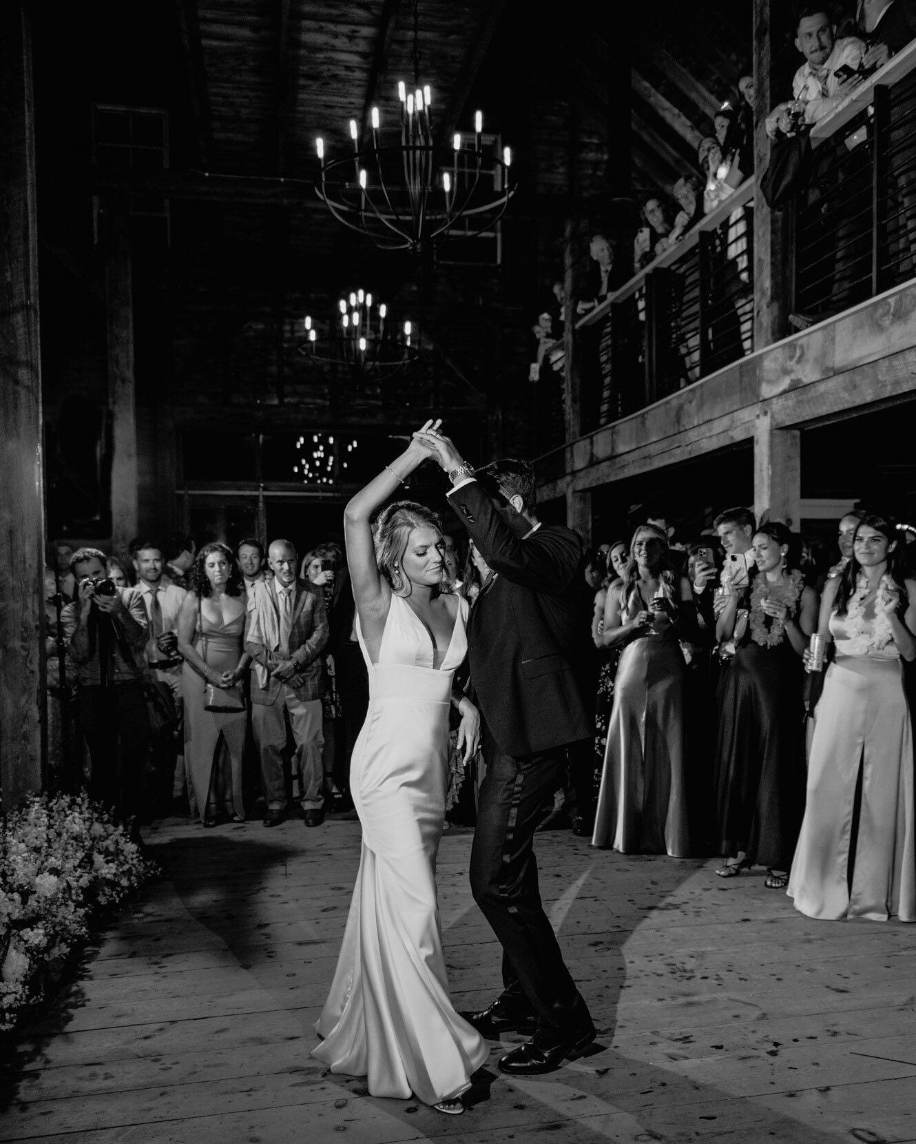 Barn Wedding reception at Scotland Fields in York Maine. Photo of bride and groom during their first dance.