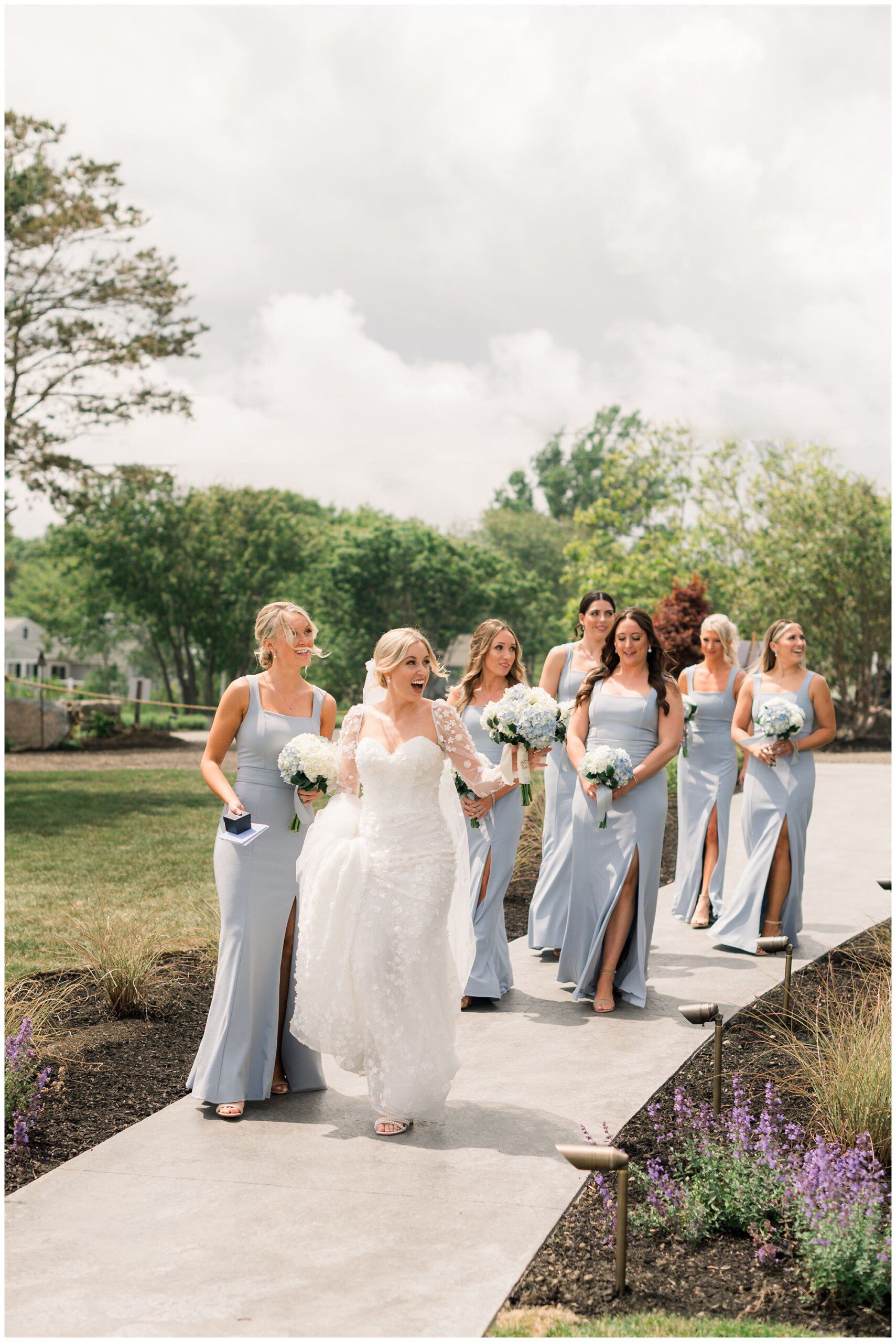 Bridesmaids walking on Viewpoint hotel property in York Maine
