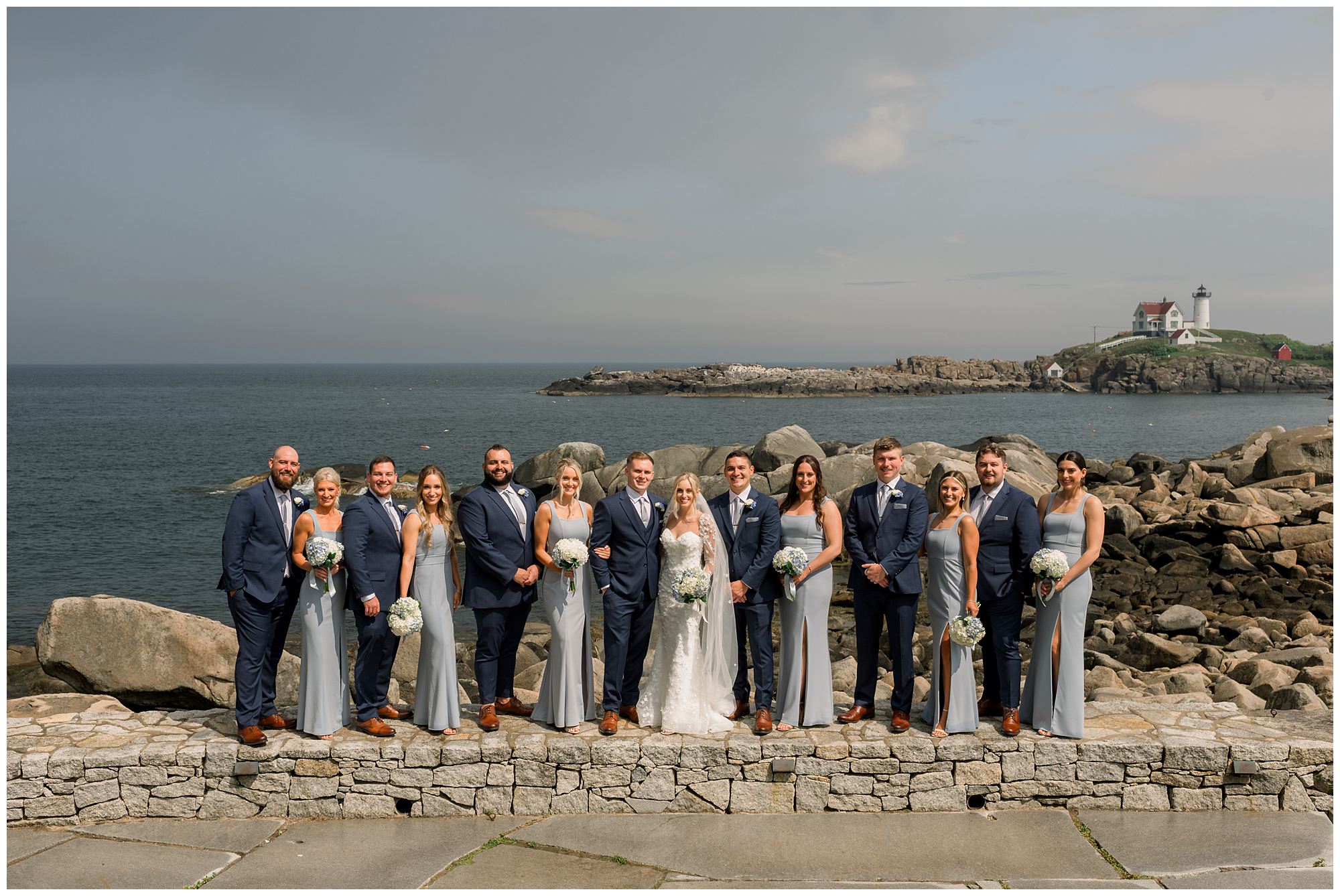 Wedding party photos overlooking Nubble Light at Viewpoint Hotel in York Maine