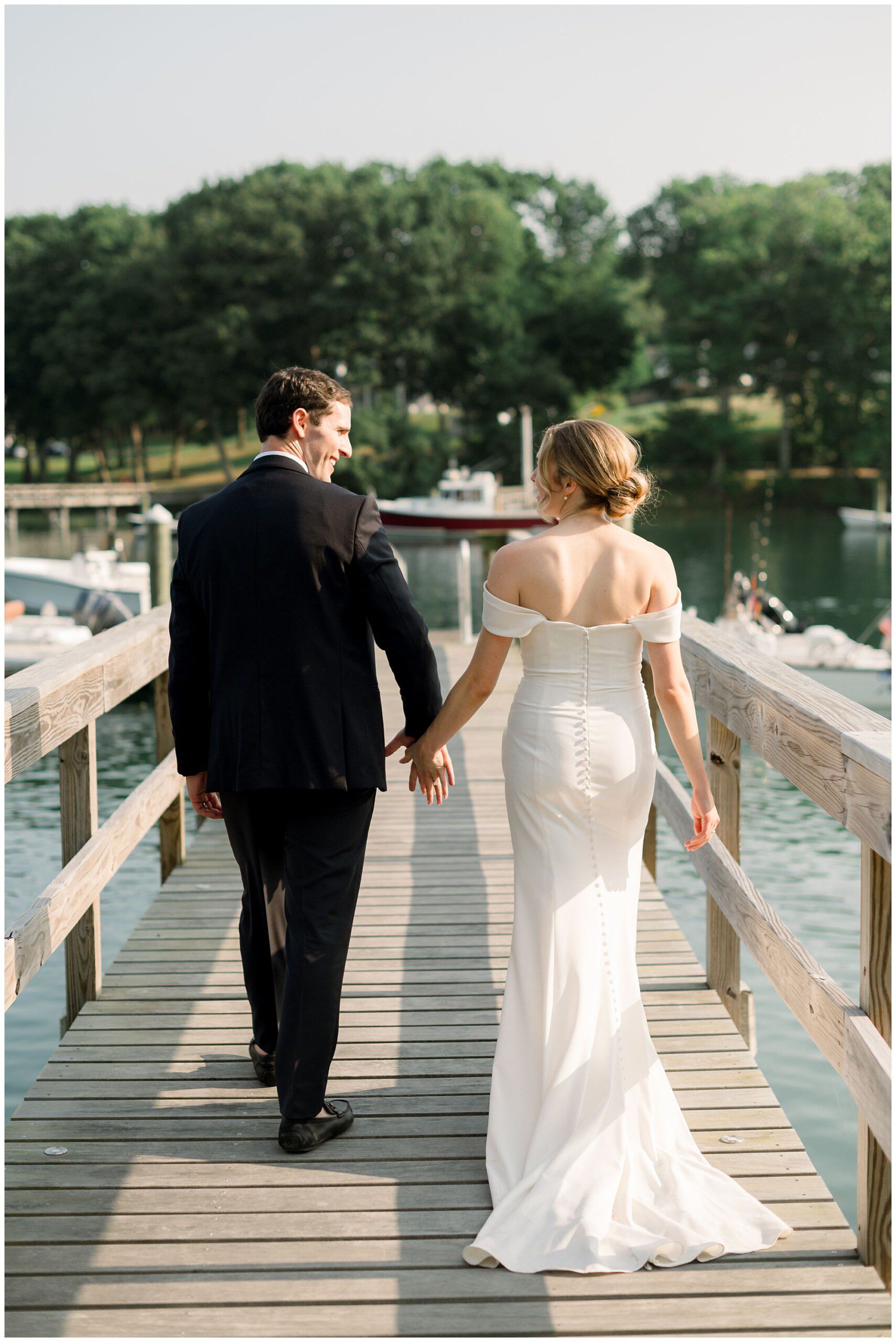 Just married photos of Bride & Groom at York Golf & Tennis Club's riverfront dock