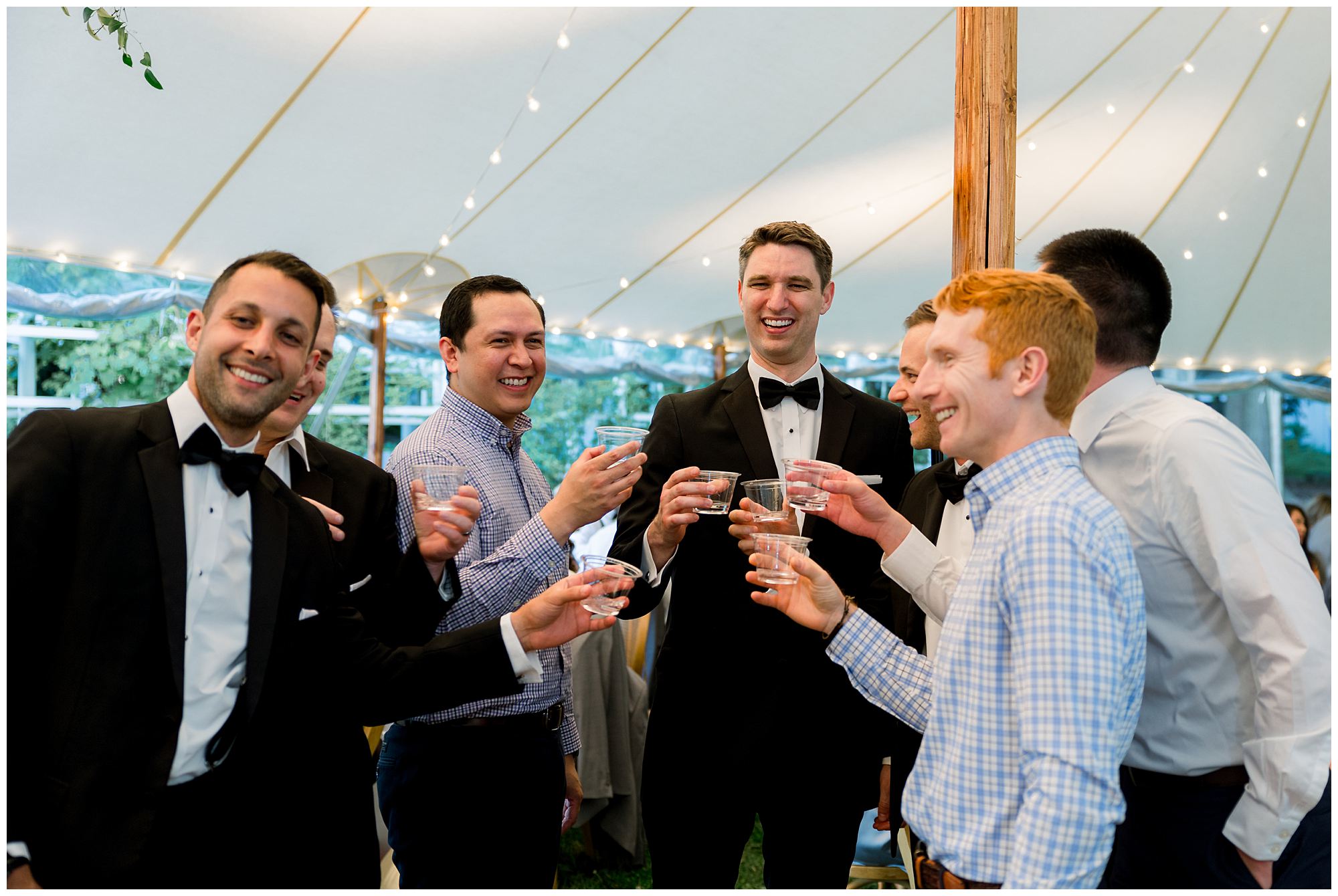 Tented wedding reception at Langdon House. Toast photos.