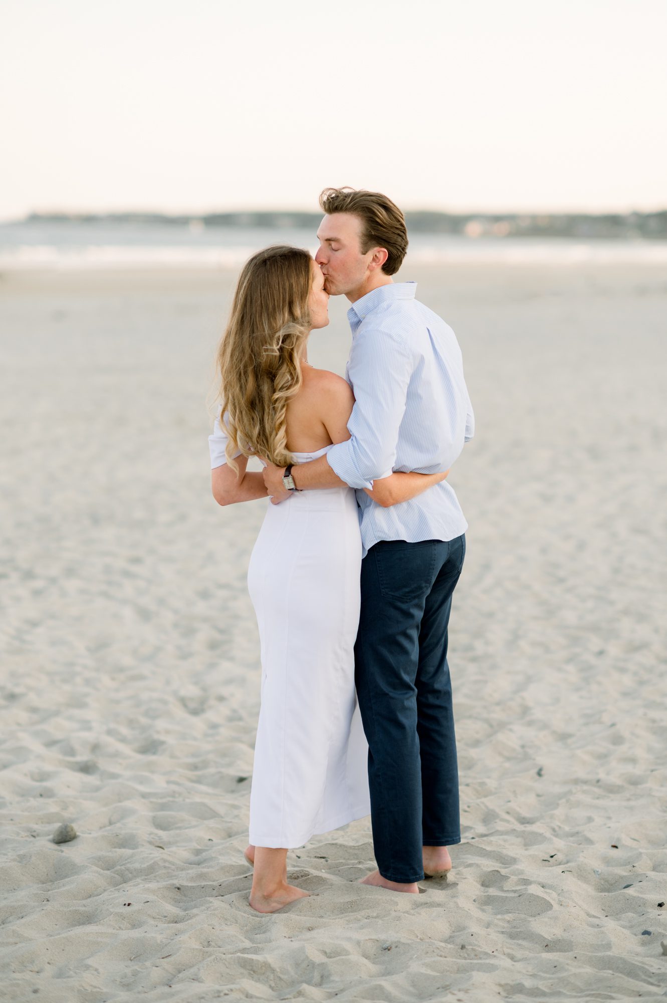 Engagement photos at Footbridge beaching Ogunquit Maine.