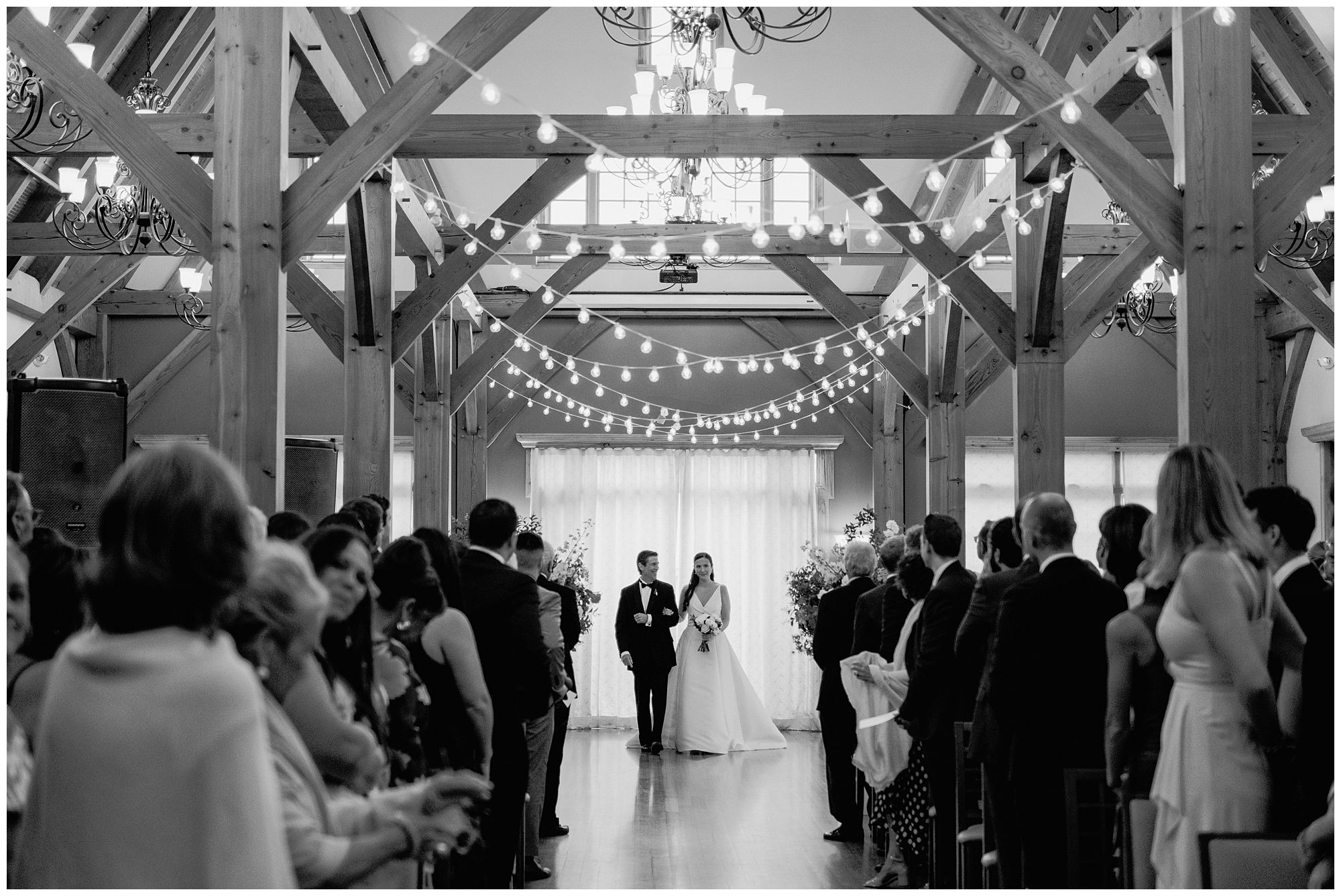 Indoor Wedding ceremony at Red Barn at Outlook Farm in North Berwick, Maine