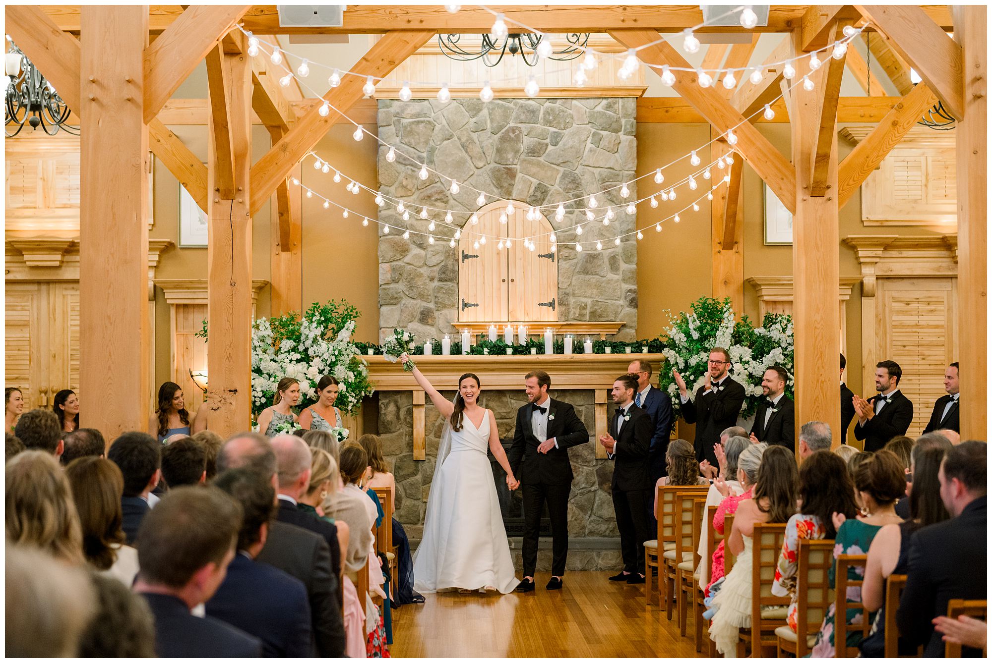 Indoor Wedding ceremony at Red Barn at Outlook Farm in North Berwick, Maine