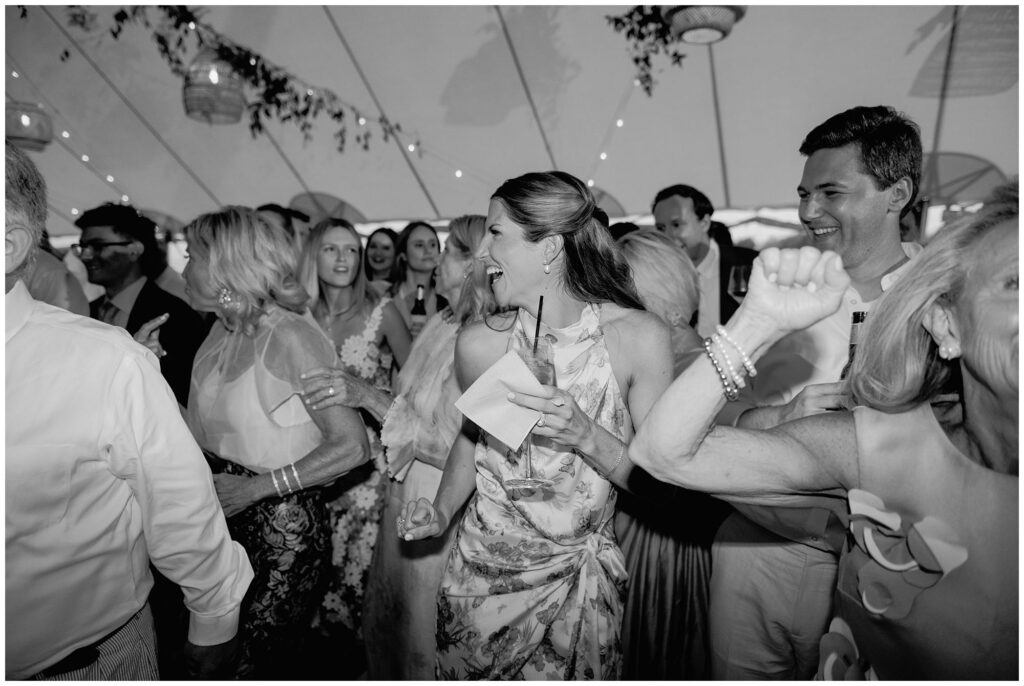 Reception dancing photos under the tent at Breakwater Inn
